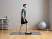 Exercise 1: Standing on one leg on balance cushion with knee bend