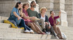 Family sitting on stairs