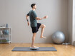 Exercise 2: Standing on one leg on balance board with knee and hip bend