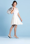 Woman in dress wearing Juzo Hostess