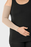 Woman wearing a Juzo compression sleeve