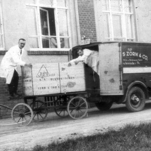 Historical image with delivery truck