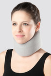 Woman wearing cervical collar support 